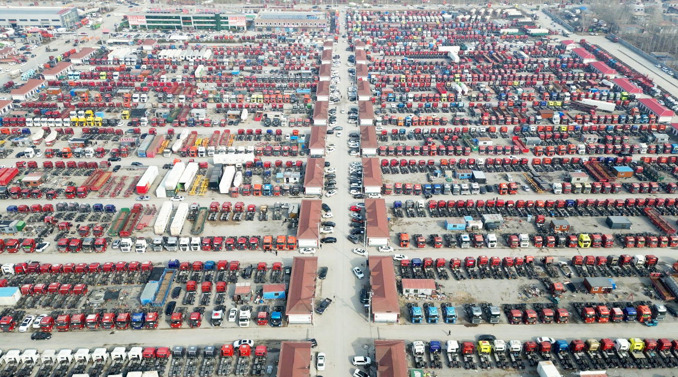 梁山华通的车轮传承：卡车父子的 